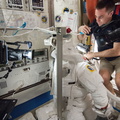 Chris Cassidy Works on a Spacesuit - 9672596919_6c1c472cd2_o.jpg