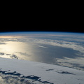 the-suns-glint-beams-off-a-partly-cloudy-pacific-ocean_52611272625_o.jpg