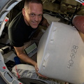 astronaut-bob-hines-packs-cargo-inside-the-spacex-dragon_52376906593_o.jpg