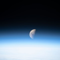 a-first-quarter-moon-above-the-earths-limb_48909057353_o.jpg