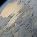 nasa2explore_50922679372_The_Earths_horizon_and_a_cloudy_Atlantic_Ocean.jpg